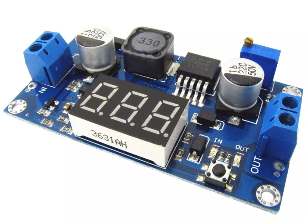 close up of xl6009 DCDC boost converter which can be placed in 3D printed housing case with display visible and toggle button reachable